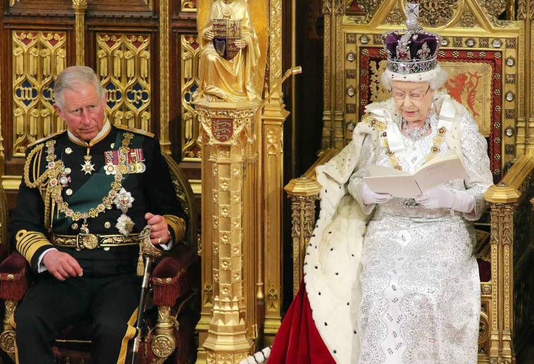 Image: Britain's Queen Elizabeth sits next to Prince Charles as she reads the Queen's Speech in the House of Lords, during the State Opening of Parliament at the Palace of Westminster in London